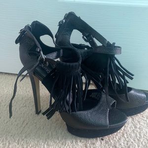 Black platform heels with fringes